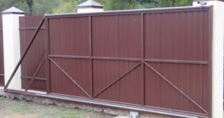 Купить откатные ворота из профнастила Кизляр, цена от 1729 руб.